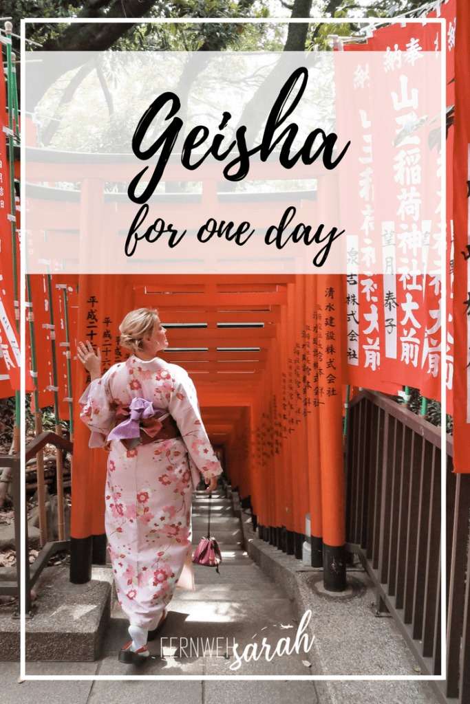 Hie Shrine in Tokio with red Tori archway and Fernwehsarah in a Kimono from Kimono Rental Yae in Front