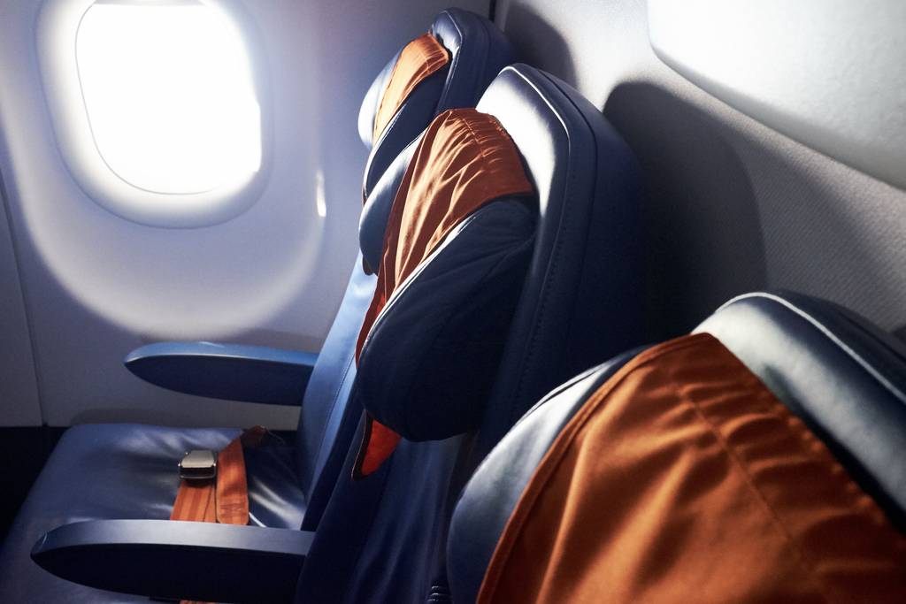 Air plane seats in economy class - travel essentials for long haul flights