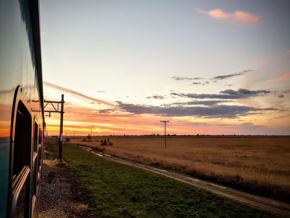 South Africa Photo Inspiration - Instaworthy shots - Sunset from Train from Johannesburg to Cape Town