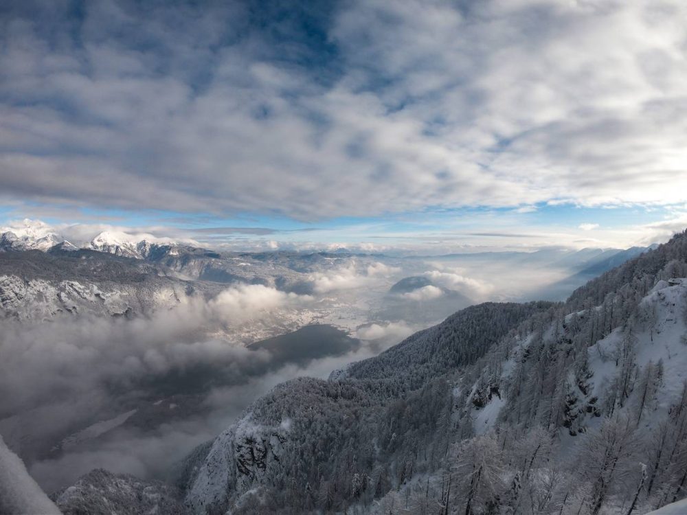 Lake Bohinj in Winter view from gondola up to Vogel Ski Resort - find the best ski resorts in Slovenia - the ultimate guide to skiing in Slovenia