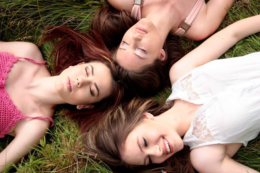 Group of Girls lying on the grass
