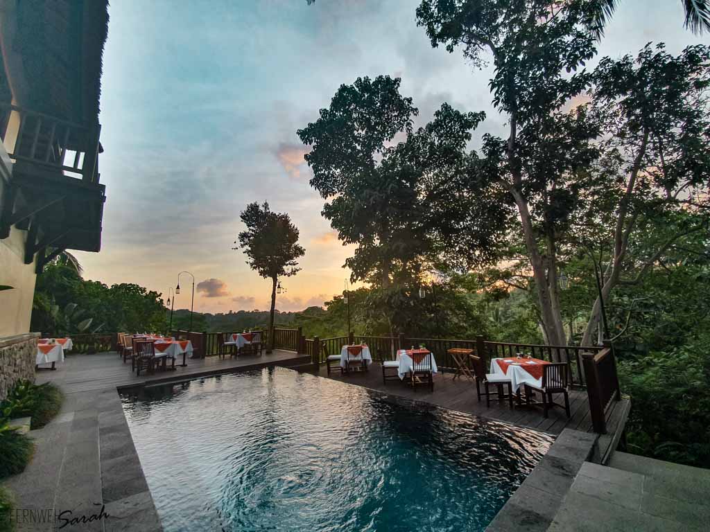 The Dining Corner during Daylight with a decorative central pool