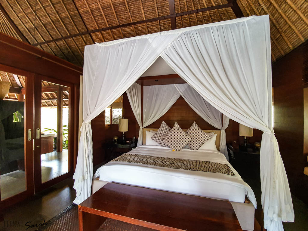 Canopy bed in this luxury private pool villa in Ubud