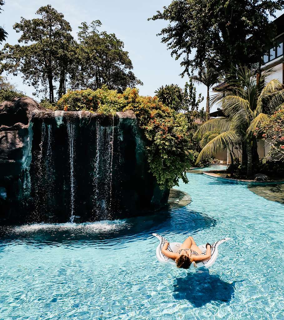 Floating in the lagoon pool of Padma Resort Legian
