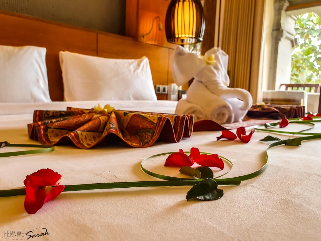 Beautiful flower decoration on our bed