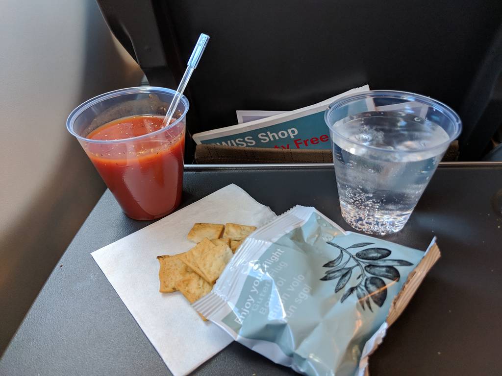 Rosemary Crackers and Tomato Juice + Water in Swiss Air Economy Class Food