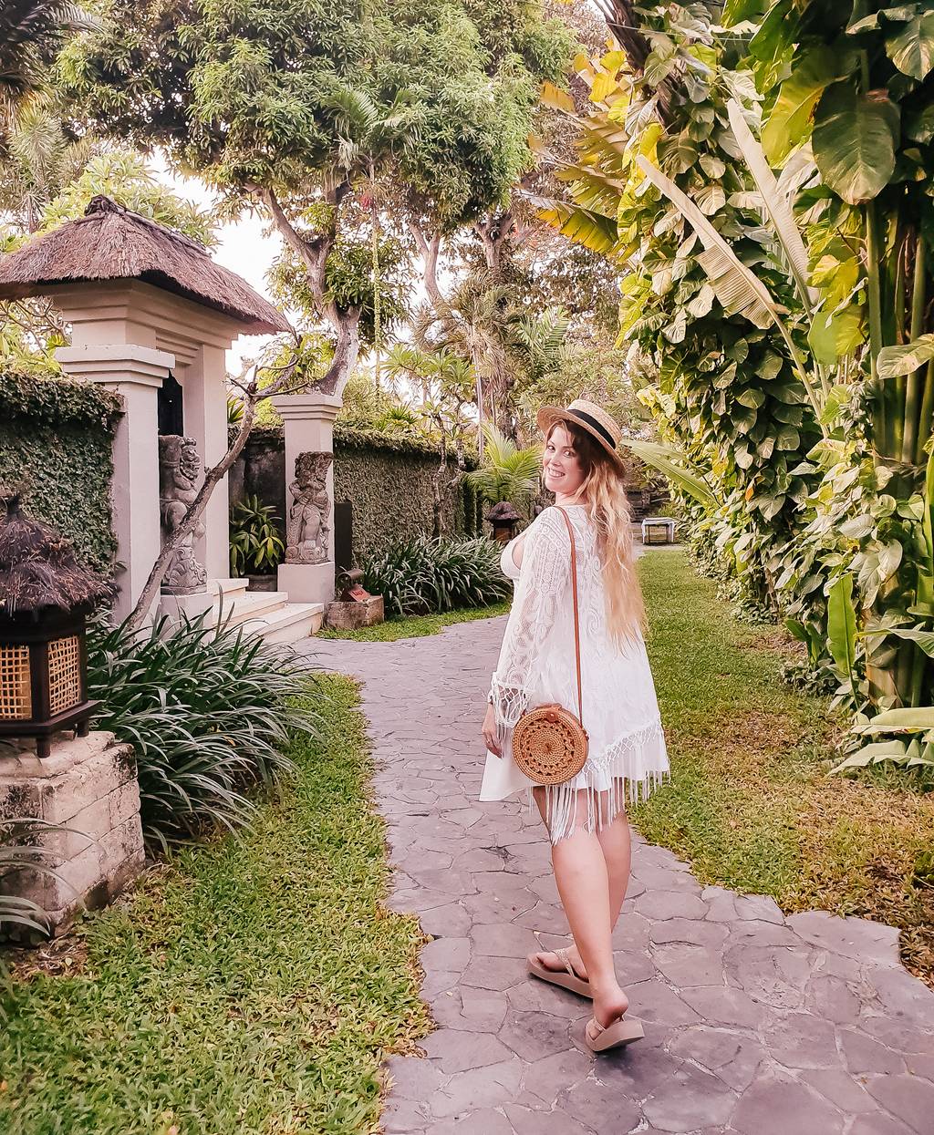 Sarah walking in Bali in a short white dress - time to prevent chub rub!